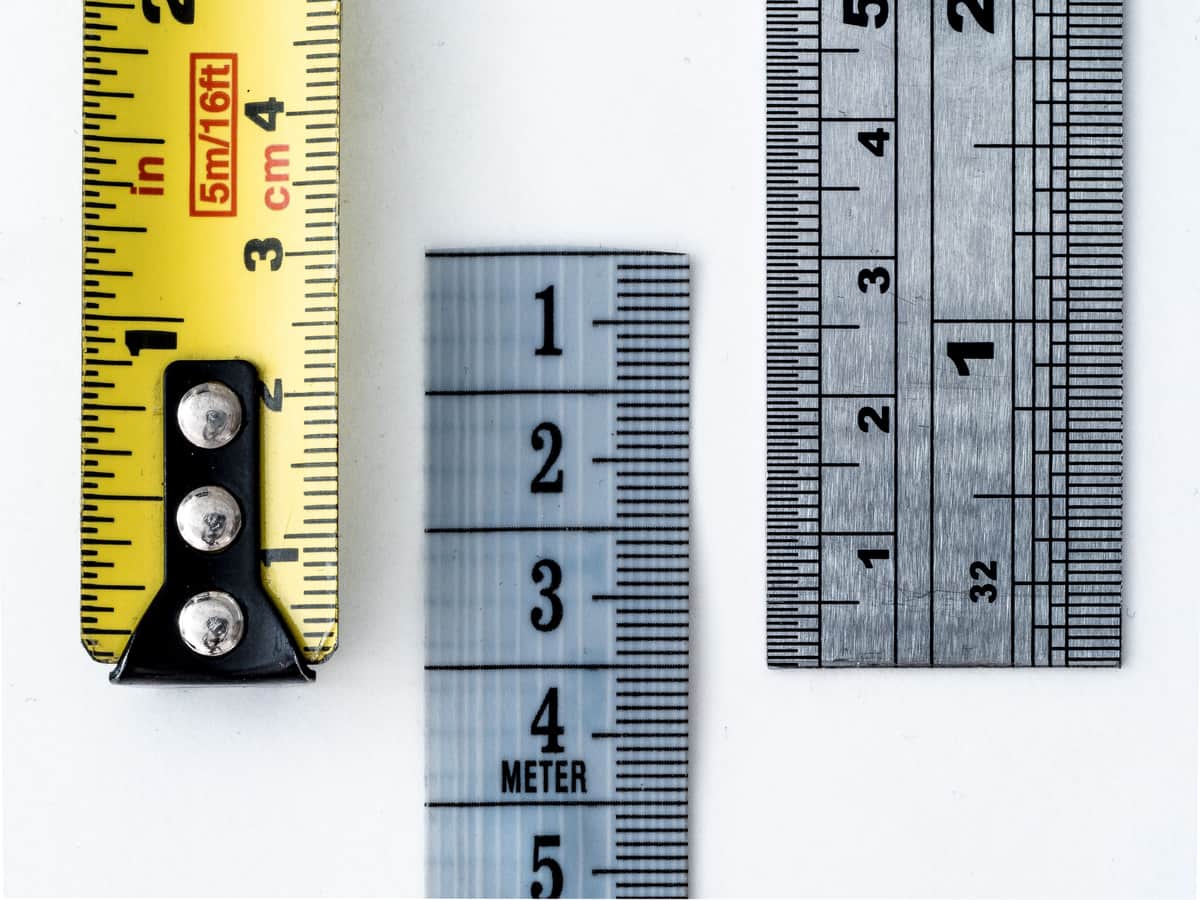 Tape measure and ruler on a work surface