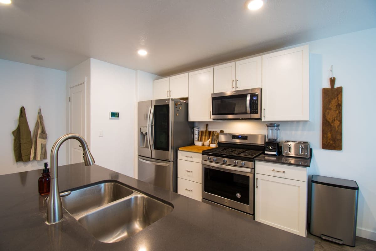 Stainless steel trash can in a modern kitchen